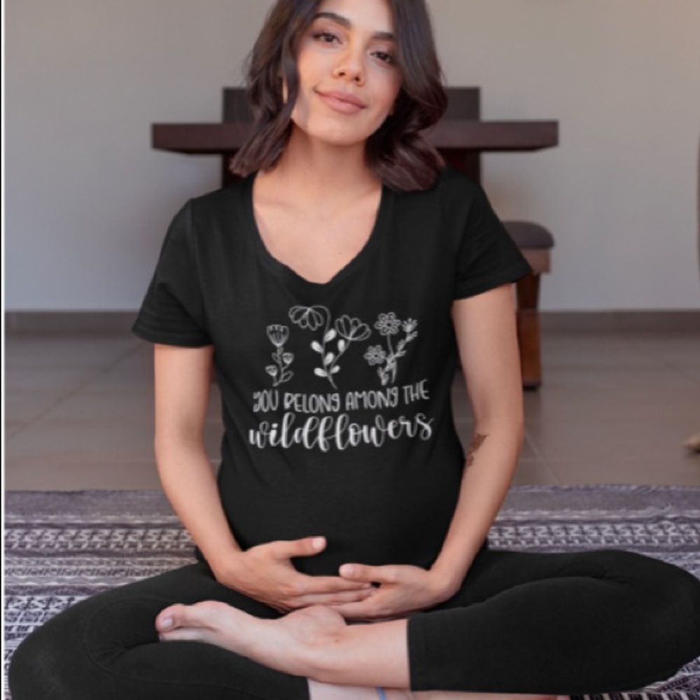 NWT “Wild Flowers” Black Maternity T-shirt. Scoop Neckline and short sleeve.